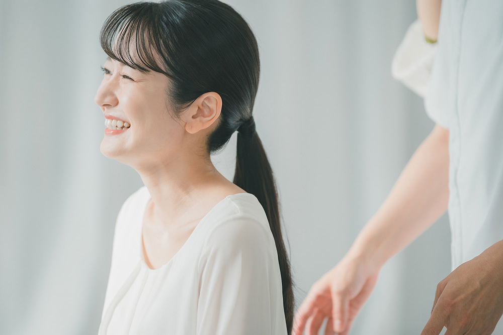 腰痛が治る女性の画像